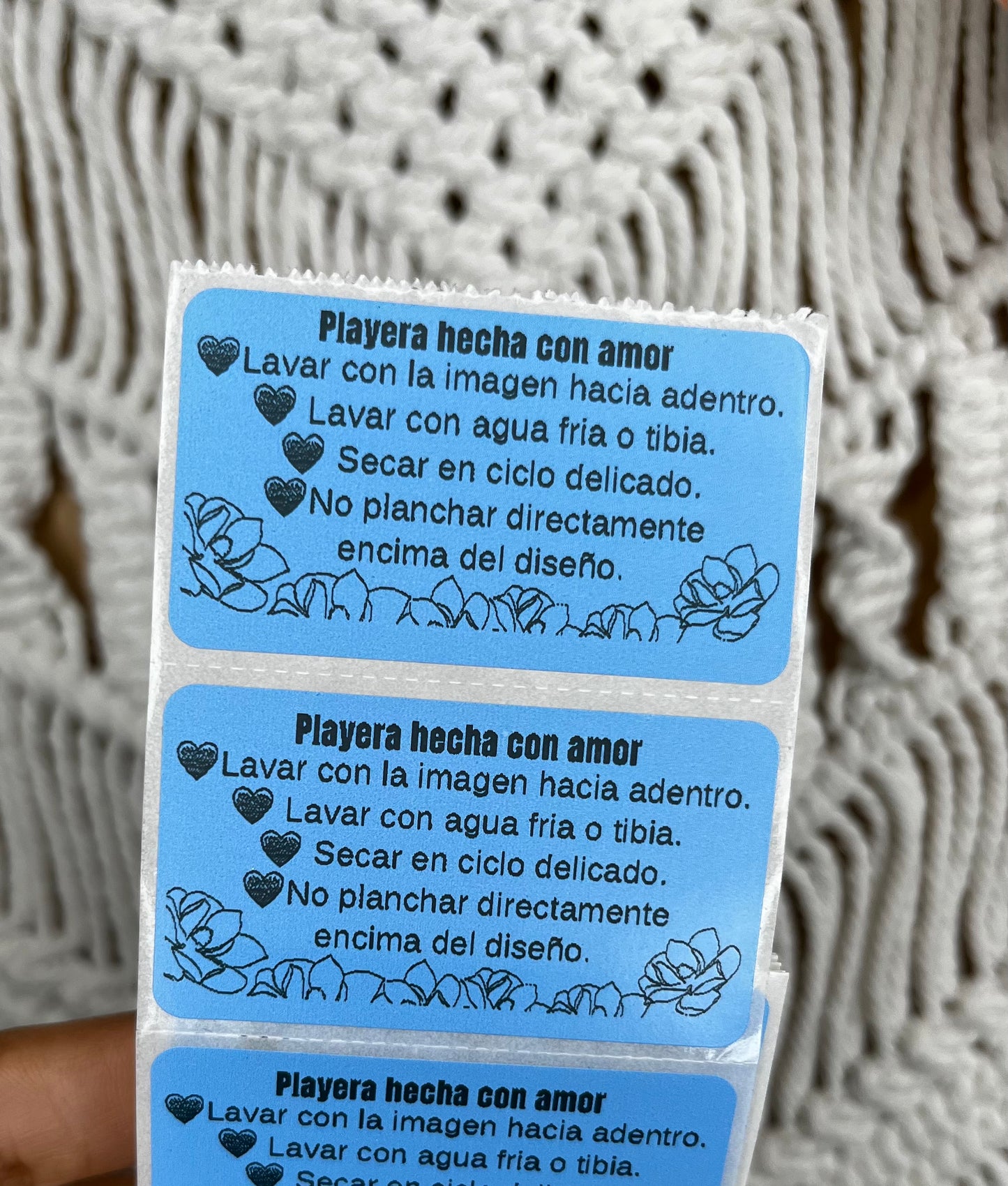 Paquete de 100 stickers con instrucciones de cuidado para playeras